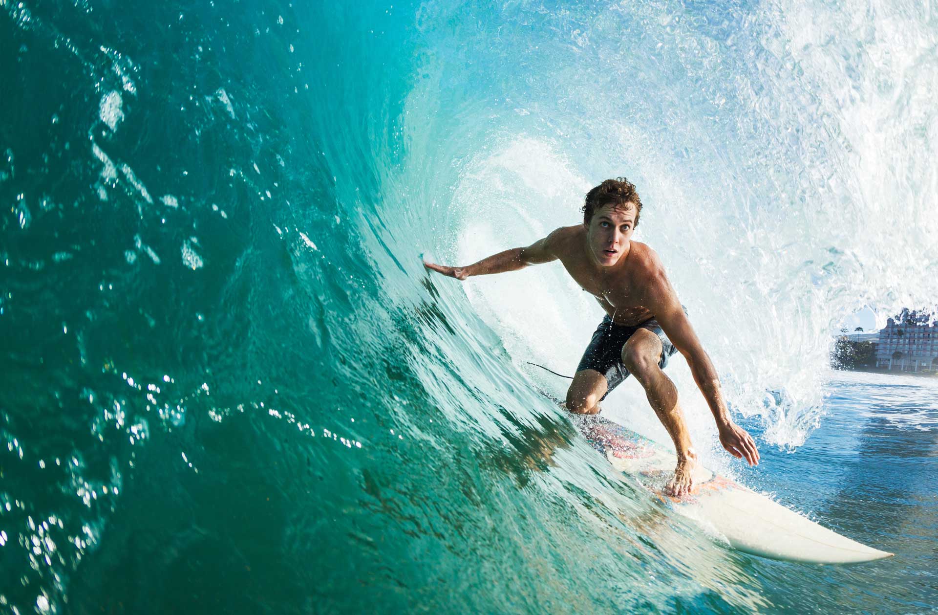 Surfer riding a barreling wave on Morocco's Atlantic coast